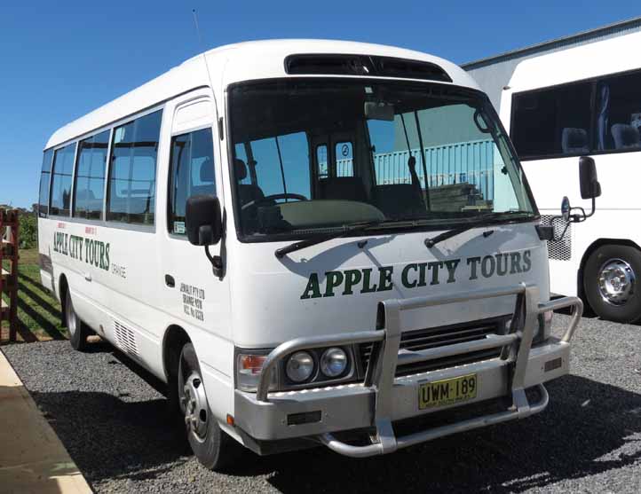 Apple City Tours Toyota Coaster UWM189